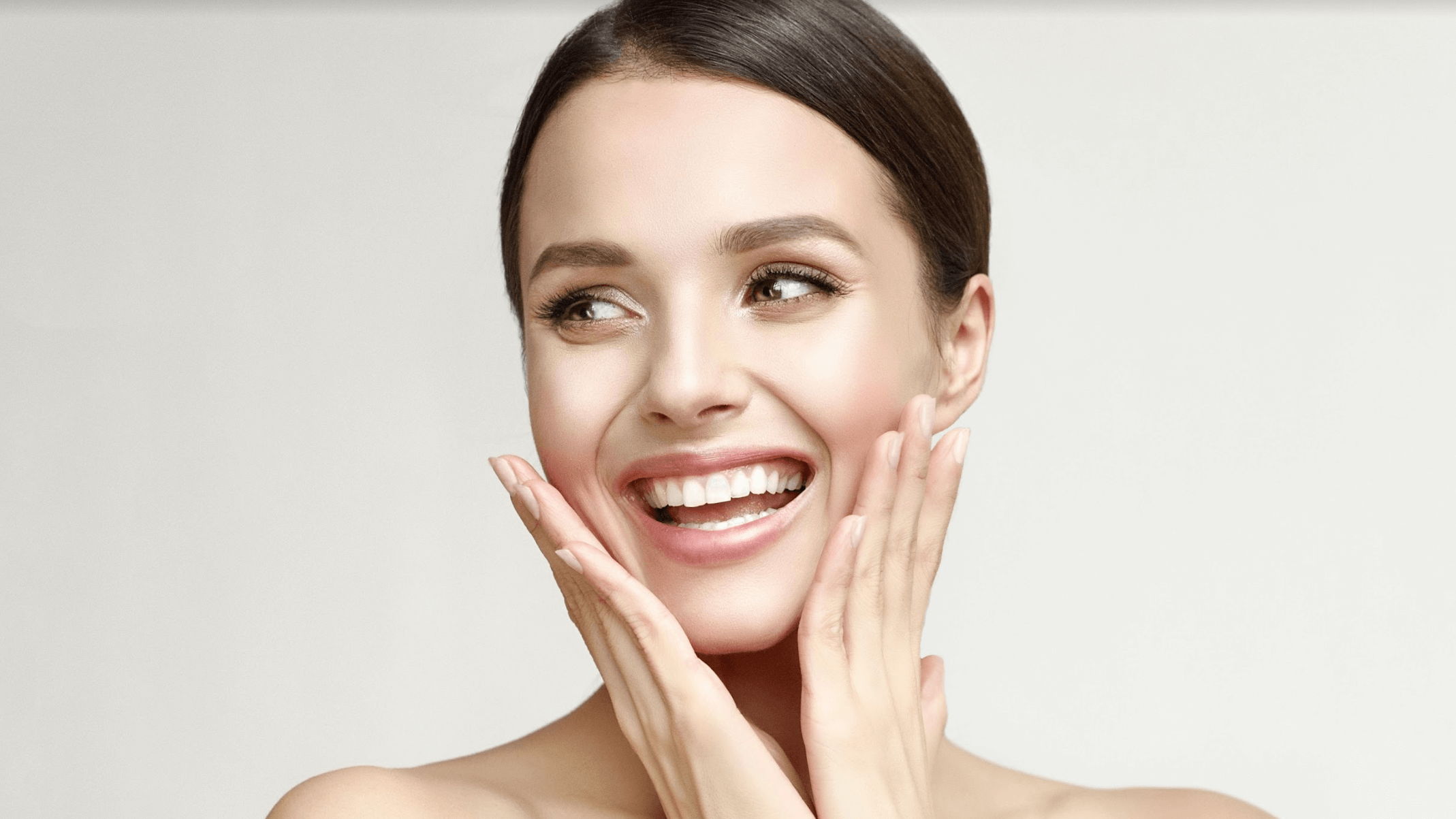 woman touching her face
